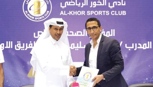 Al Khor Sports Club president Hassan Juma al-Mohannadi (left) and new coach Adel Sellimi.