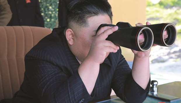 North Koreau2019s leader Kim Jong-un supervises a military drill in North Korea.