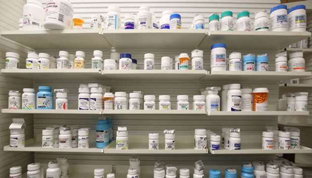 Bottles of drugs sit on the shelf at the Rock Canyon Pharmacy