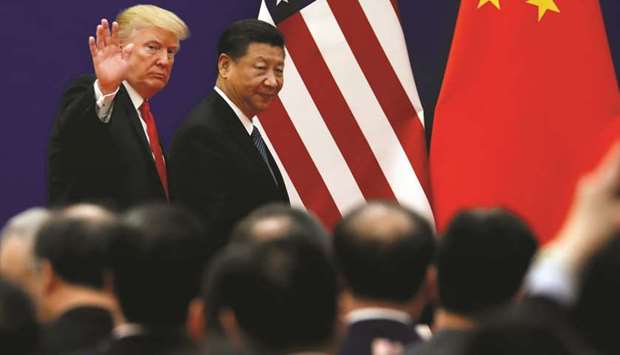 US President Donald Trump and Chinau2019s President Xi Jinping meet business leaders at the Great Hall of the People in Beijing on November 9, 2017. China and the US ended talks in Washington on Friday with no deal after US President Donald Trump raised tariffs on more than $200bn in goods from the country and China vowed to retaliate.
