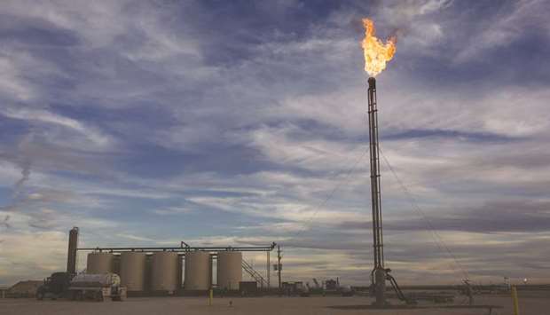 A gas flare burns at a site in the Permian Basin area of Loving County, Texas (file). Americau2019s shale industry, with its beating heart in the Permian Basin of Texas and New Mexico, has taken centre stage in the global oil market as it propelled the US back to its long-lost post of worldu2019s biggest producer.