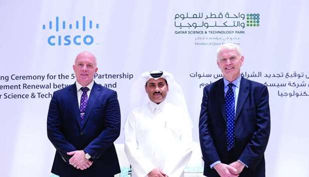Dr Richard O'Kennedy, Yosouf Abdulrahman Saleh and Shane Heraty during the signing ceremony.