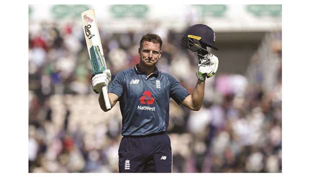 Englandu2019s Jos Buttler celebrates after scoring a 50-ball hundred during the second one-day international against Pakistan at The Ageas Bowl in Southampton. (AFP)