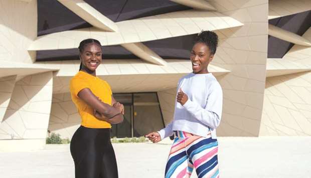 USA's Olympic long jump champion Tianna Bartoletta (right) and Britainu2019s Dina Asher-Smith, the European 100m and 200m champion, pose after visiting the National Museum of Qatar (NMoQ) on Tuesday.