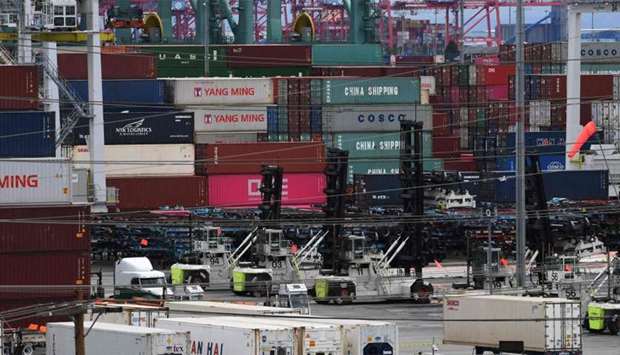 Unloaded containers from Asia are seen at the main port terminal in Long Beach, California