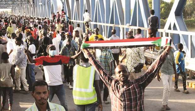 Sudanese protesters gather during a demonstration in the capital Khartoum, yesterday.