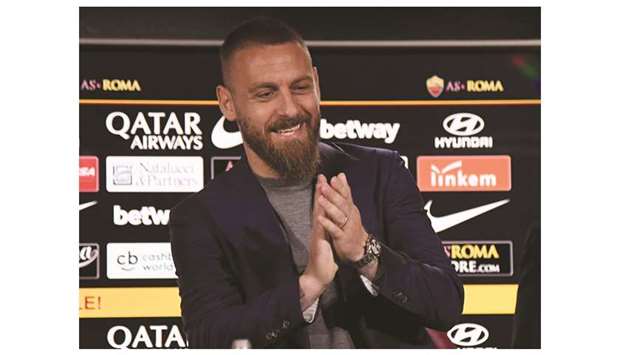 Romau2019s Daniele De Rossi attends a press conference in Rome yesterday. (Reuters)