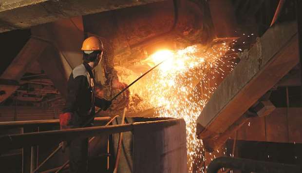 In this file photo taken on April 6, 2015, an employee works at Iran Alloy Steel Companyu2019s plant in the central Iranian city of Yazd. Relatively decentralised, the sector is less vulnerable to sanctions, experts say.