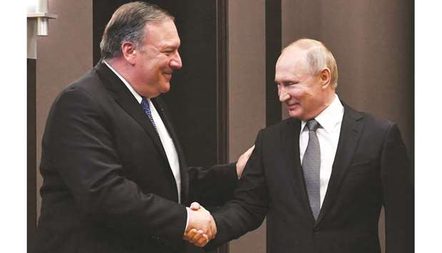 Putin welcoming Pompeo to the meeting in Sochi.