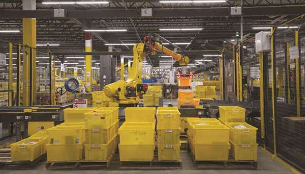 A palletiser machine moves bins filled with products at the Amazon.com fulfilment centre in Baltimore, Maryland, US. With e-commerce causing a structural shift in shopping and fuelling the air freight market worldwide, cargo segment has become a key driver of airline revenues.