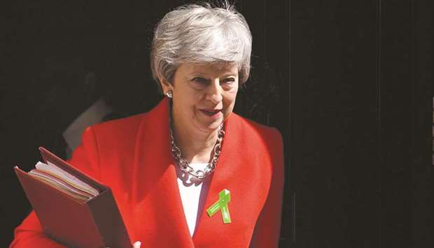 Prime Minister Theresa May leaves 10 Downing Street in London yesterday, ahead of the weekly Prime Ministeru2019s Questions (PMQs) in the House of Commons.