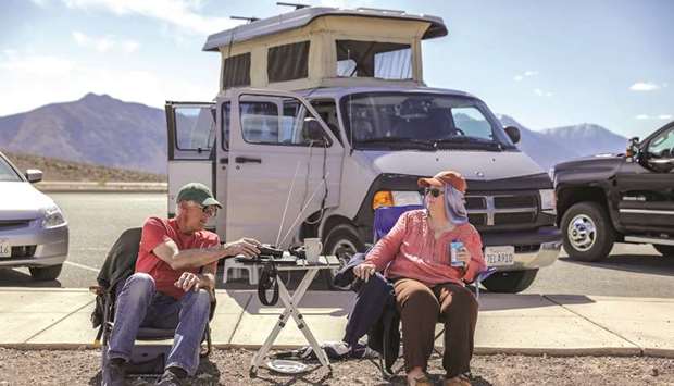 POWER (SHOW) COUPLE: For six years, Richard, 71, and Candace Campbell of Pacific Cove, California, have been making the eight-hour trek in there 2001 Dodge 2500 cargo van that was converted to a camper, to Rainbow Canyon to watch fighter jets blast through the gorge.