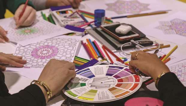 A moment from the colouring for adults workshop at Qatar National Library yesterday.