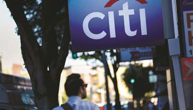 A signage is displayed outside of a Citibank branch in Los Angeles. Citigroup was hit hardest with a u20ac310.8mn penalty, followed by fines of u20ac249.2mn and u20ac228.8mn for RBS and JPMorgan, for colluding on foreign-exchange trading strategies, the European Commission said in a statement yesterday.