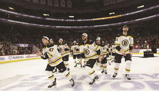 Boston Bruins players take a lap of honour after winning the Eastern Conference Finals during the 2019 NHL Stanley Cup Playoffs in Raleigh, North Carolina. (AFP)