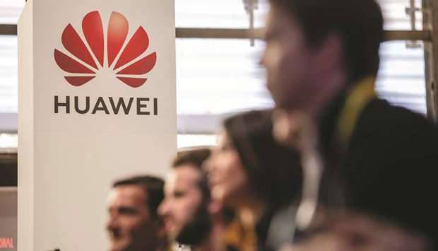 The Huawei Technologies logo sits on the companyu2019s exhibition stand at the Viva Technology conference in Paris. Out of $70bn Huawei spent buying components in 2018, some $11bn went to US firms including Qualcomm, Intel Corp and Micron Technology.