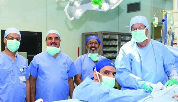 Medical Director of HMC's Hamad General Hospital and Head of Qatar Organ Transplant Centre Dr Yousuf al-Maslamani with other members of the team of doctors that performed the transplant.