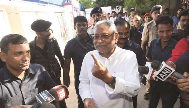 Bihar Chief Minister Nitish Kumar comes out of a polling booth after casting his vote in Patna yesterday.