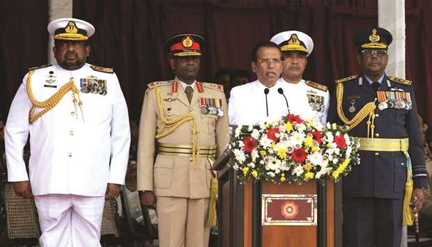 Sri Lankan President Maithripala Sirisena, centre, delivers a speech during the National War Heroes Day in Colombo yesterday.