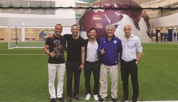 Former footballers Cafu of Brazil, Youri Djorkaeff of France and Argentinian player Pablo Zabaleta pose at the Aspire Academy.