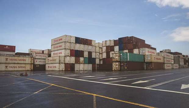 Shipping containers sit stacked at the Port of Kaohsiung in Taiwan. The countryu2019s export orders in April dropped 3.7% from a year earlier to $37.66bn, ministry of economic affairs data showed yesterday.