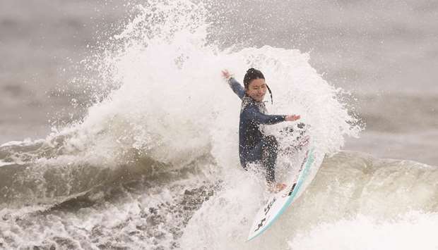 Japanese pro surfer Shino Matsuda during a training session in Kamogawa. (AFP)