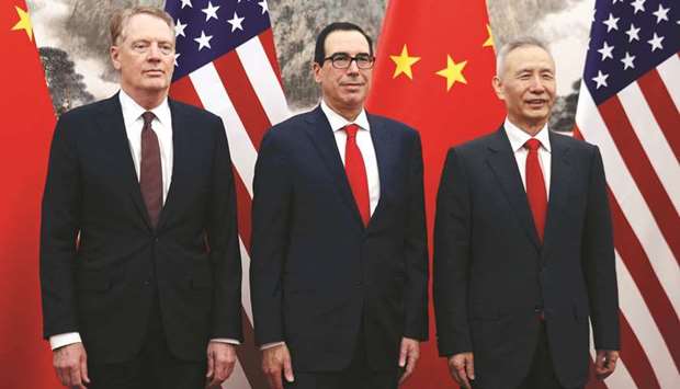 Chinese Vice Premier Liu He (right), US Treasury Secretary Steven Mnuchin (centre) and Trade Representative Robert Lighthizer pose before they proceed to their meeting at the Diaoyutai State Guesthouse in Beijing yesterday. u201cLighthizer and I just concluded productive meetings with Chinau2019s Vice Premier Liu He. We will continue our talks in Washington next week,u201d Mnuchin wrote on his Twitter account.