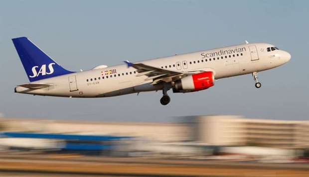 A Scandanavian Airlines, known as SAS, aeroplane takes off from the airport in Palma de Mallorca, Sp