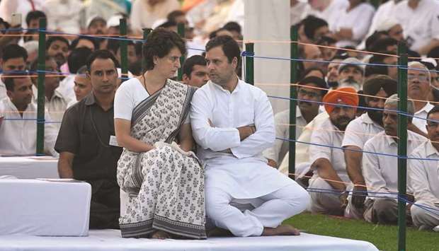 Congress president Rahul Gandhi speaks with his sister Priyanka Gandhi Vadra, the Congress general secretary, at an event to pay homage to their father and former prime minister Rajiv Gandhi on the anniversary of his 1991 assassination, at the Veer Bhumi memorial site in New Delhi yesterday.