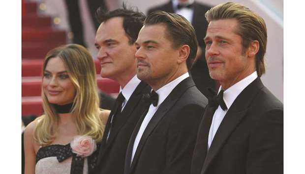 Australian actress Margot Robbie with Tarantino, DiCaprio and Pitt pose yesterday as they arrive for the screening of the film Once Upon a Time In Hollywood at the 72nd edition of the Cannes Film Festival.