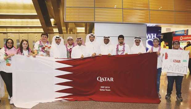 The Qatar team and officials.