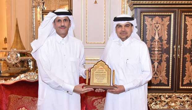 QIIB honoured its chief executive officer Abdulbasit Ahmad al-Shaibei at a ceremony attended by dignitaries including the bank's chairman Sheikh Dr Khalid bin Thani bin Abdullah al-Thani