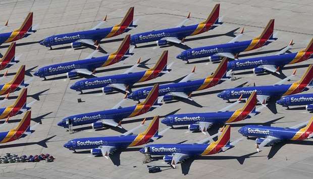 Southwest Airlines Boeing 737 MAX aircraft are parked on the tarmac after being grounded, at the Southern California Logistics Airport in Victorville, California