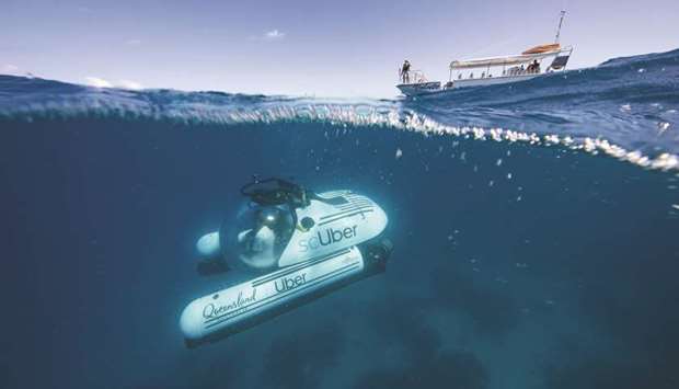 A Uber submarine diving on the Great Barrier Reef at Heron Island in Queensland.