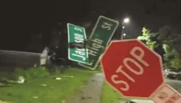 A damaged sign pictured on a street in Jefferson City, Missouri, after a tornado hit the city late on Wednesday.