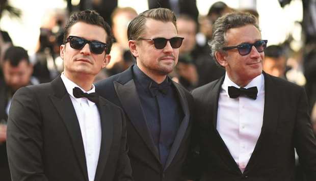 British actor Orlando Bloom (left), US actor Leonardo DiCaprio (centre) and Spanish actor Alejandro Agag arrive yesterday for the screening of The Traitor (Il Traditore) at the 72nd edition of the Cannes Film Festival.