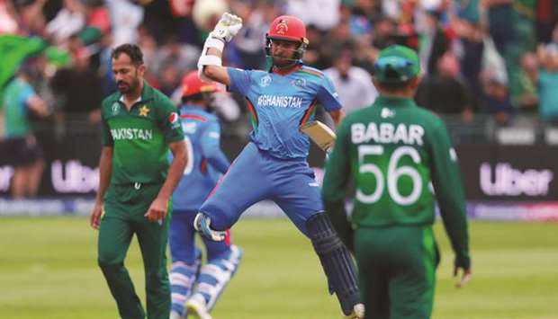 Afghanistanu2019s Hashmatullah Shahidi celebrates their victory over Pakistan in the 2019 ICC World Cup warm-up match in Bristol, England, yesterday. (Reuters)