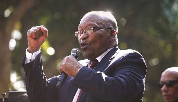 Former President Jacob Zuma speaks to supporters after his appearance in the High Court where he faces charges that include fraud, corruption and racketeering, in Pietermaritzburg, yesterday.