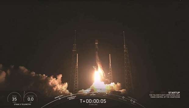 This video grab taken from the Space X webcast transmission on Thursday shows a SpaceX Falcon 9 rocket with 60 Starlink satellites lifting off from Cape Canaveral Air Force Station, Florida.
