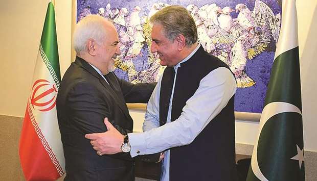 This photo released by the ministry of foreign affairs yesterday shows Qureshi greeting Zarif at the ministry in Islamabad.