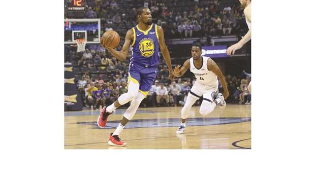 Golden State Warriors forward Kevin Durant passes the ball in front of Memphis Grizzlies forward Julian Washburn in the first quarter of their NBA game at FedExForum on April 10, 2019. PICTURE: USA TODAY Sports