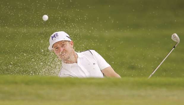 Jonas Blixt of Sweden plays a shot from a bunker on the eighth hole during the second round of the Charles Schwab Challenge at Colonial Country Club in Fort Worth, Texas. (Getty Images/AFP)