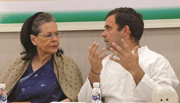 Rahul Gandhi speaks with his mother Sonia Gandhi during Congress Working Committee (CWC) meeting in New Delhi yesterday.