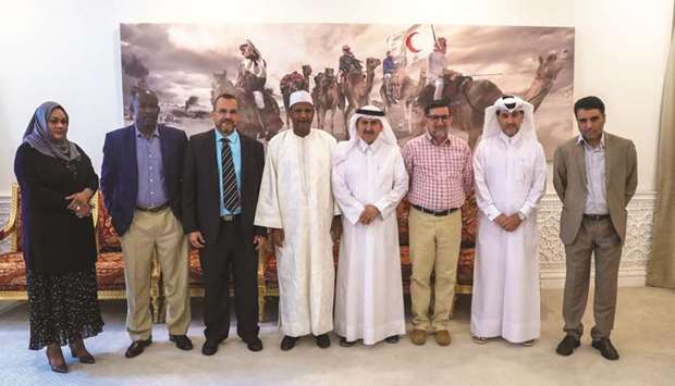 Officials from QRCS and Mali Red Cross mark the occasion.