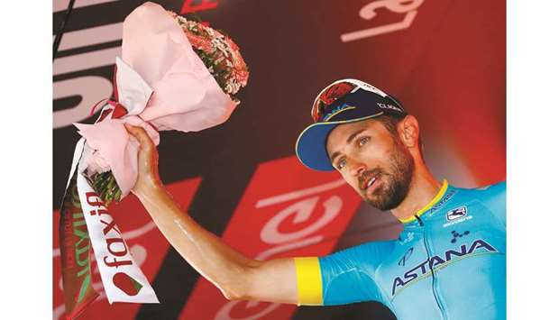 Team Astana rider Italyu2019s Dario Cataldo celebrates on podium after winning the stage fifteen of the 102nd Giro du2019Italia yesterday. (AFP)