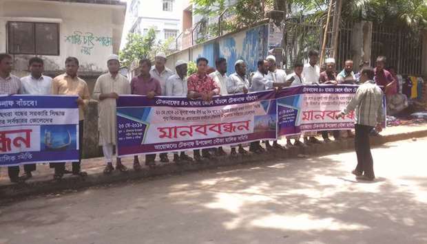 Fishermen stage a protest in Coxu2019s Bazar yesterday, after the government imposed two-month long fishing ban on the Bay of Bengal.