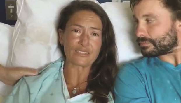 Amanda Eller speaks from her hospital bed yesterday at Maui Memorial Medical Center in Hawaii after she was rescued on Friday.