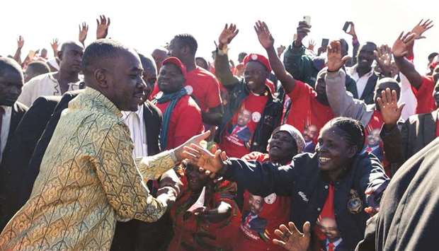 Opposition leader Nelson Chamisa greets supporters at the party congress in Gweru, Zimbabwe.