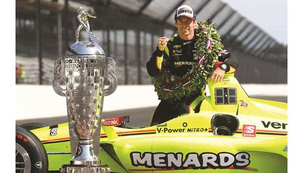 Simon Pagenaud of Penske Chevrolet poses with the Borg-Warner Trophy after the Indianapolis 500 in Indianapolis, Indiana. (Getty Images/AFP)