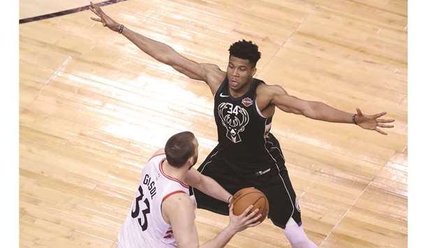 Giannis Antetokounmpo of the Milwaukee Bucks defends Marc Gasol of the Toronto Raptors during the second-half in game six of the NBA Eastern Conference Finals in Toronto. (Getty Images/AFP)